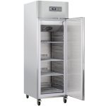 Tall stainless-steel commercial refrigerator with a glass door, open to reveal multiple adjustable wire shelves on casters.